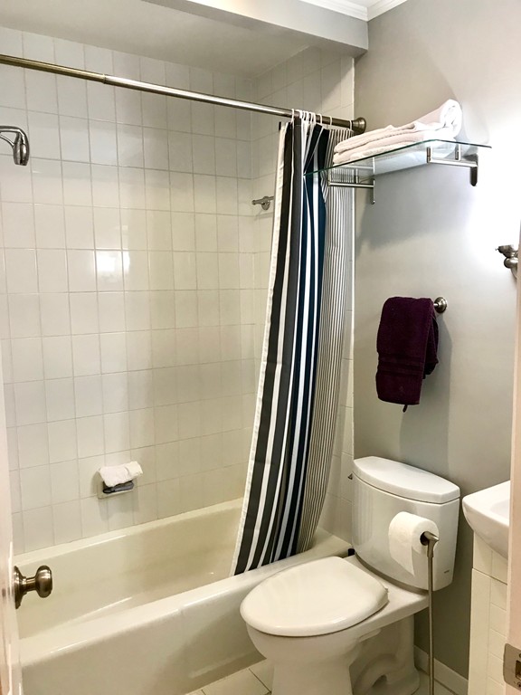 241 Beacon Street, Unit 3 Boston, MA 02116 - Photo 14 of 17 a bathroom with a toilet and a shower