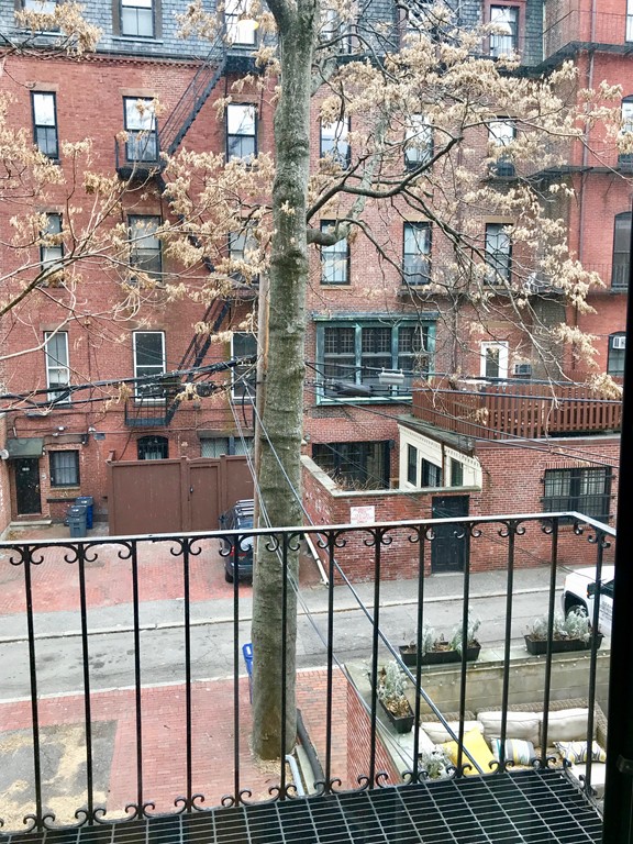 241 Beacon Street, Unit 3 Boston, MA 02116 - Photo 17 of 17 a view of a building from a balcony