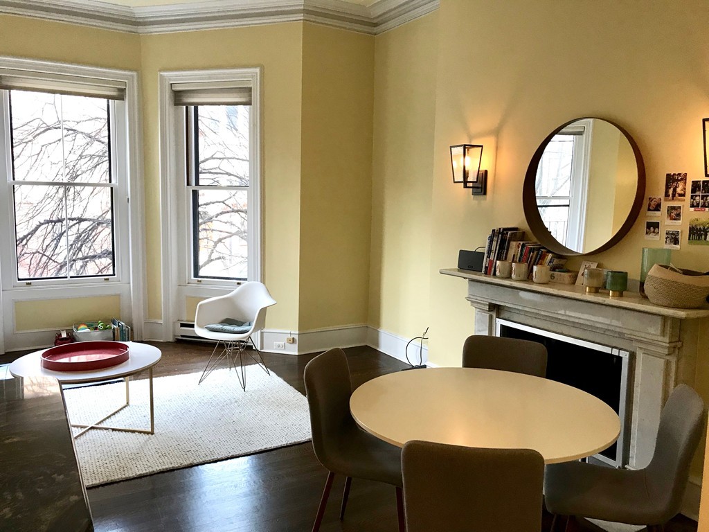 241 Beacon Street, Unit 3 Boston, MA 02116 - Photo 3 of 17 a living room with a couch and a table