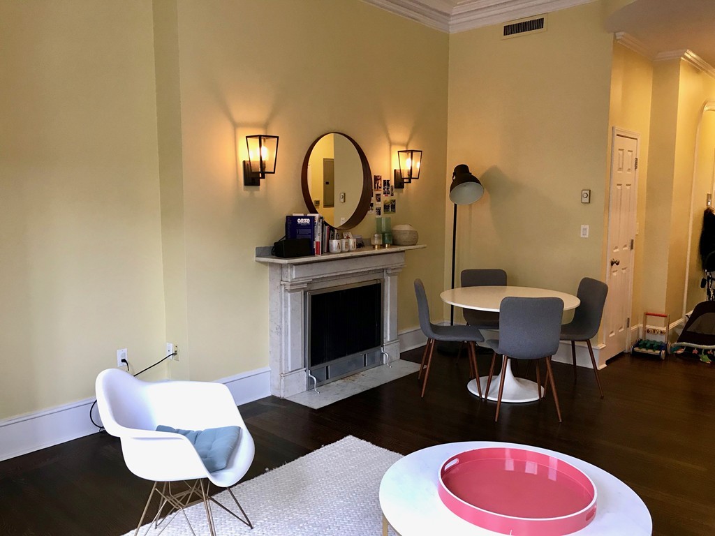 241 Beacon Street, Unit 3 Boston, MA 02116 - Photo 4 of 17 a living room with furniture a table and chair