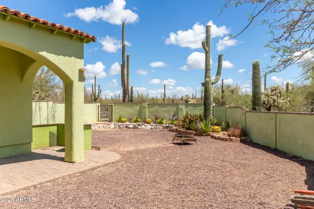 a view of a patio with a fountain