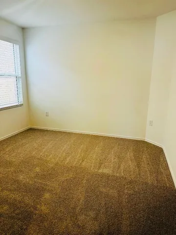 an empty room with a natural light