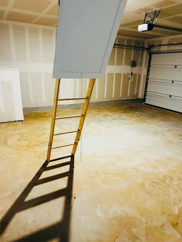 a view of an empty room with a sink