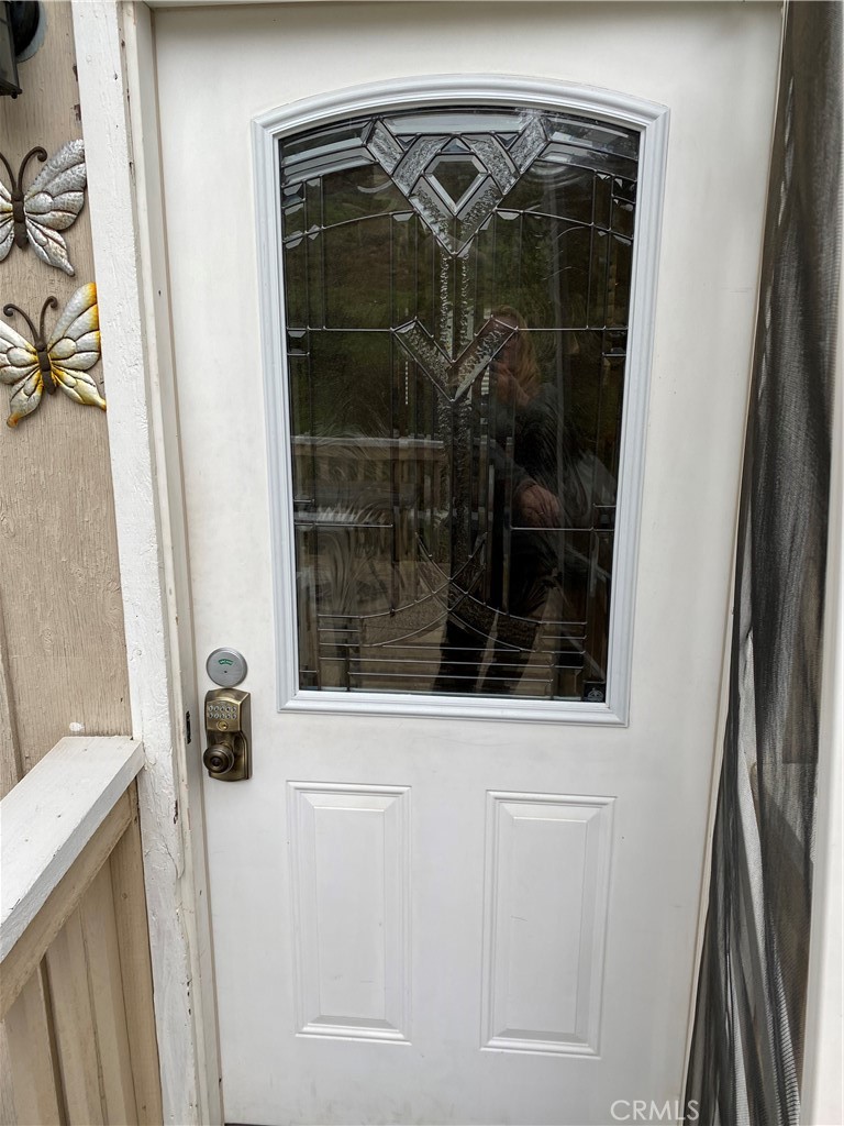 46011 Sandia Creek Drive, Unit C Temecula, CA 92590 - Photo 14 of 16 a bathroom with a shower and a mirror