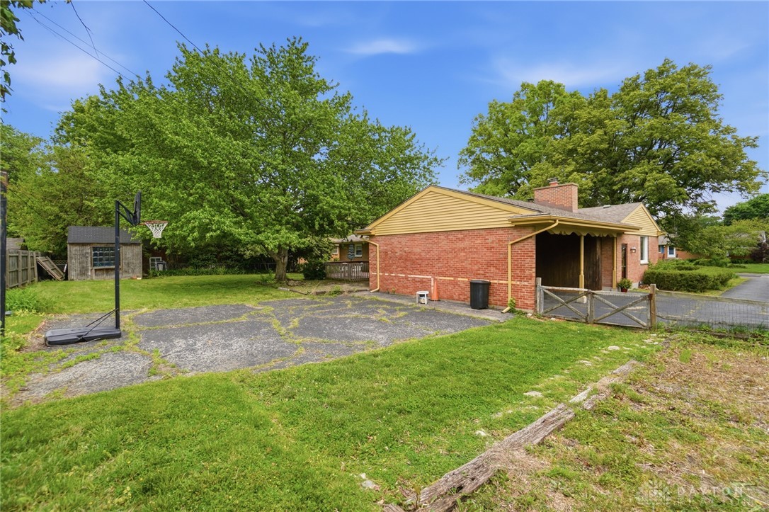 6119 Flemington Road Dayton, OH 45459 - Photo 67 of 76 This charming brick home features a spacious yard and inviting curb appeal.
