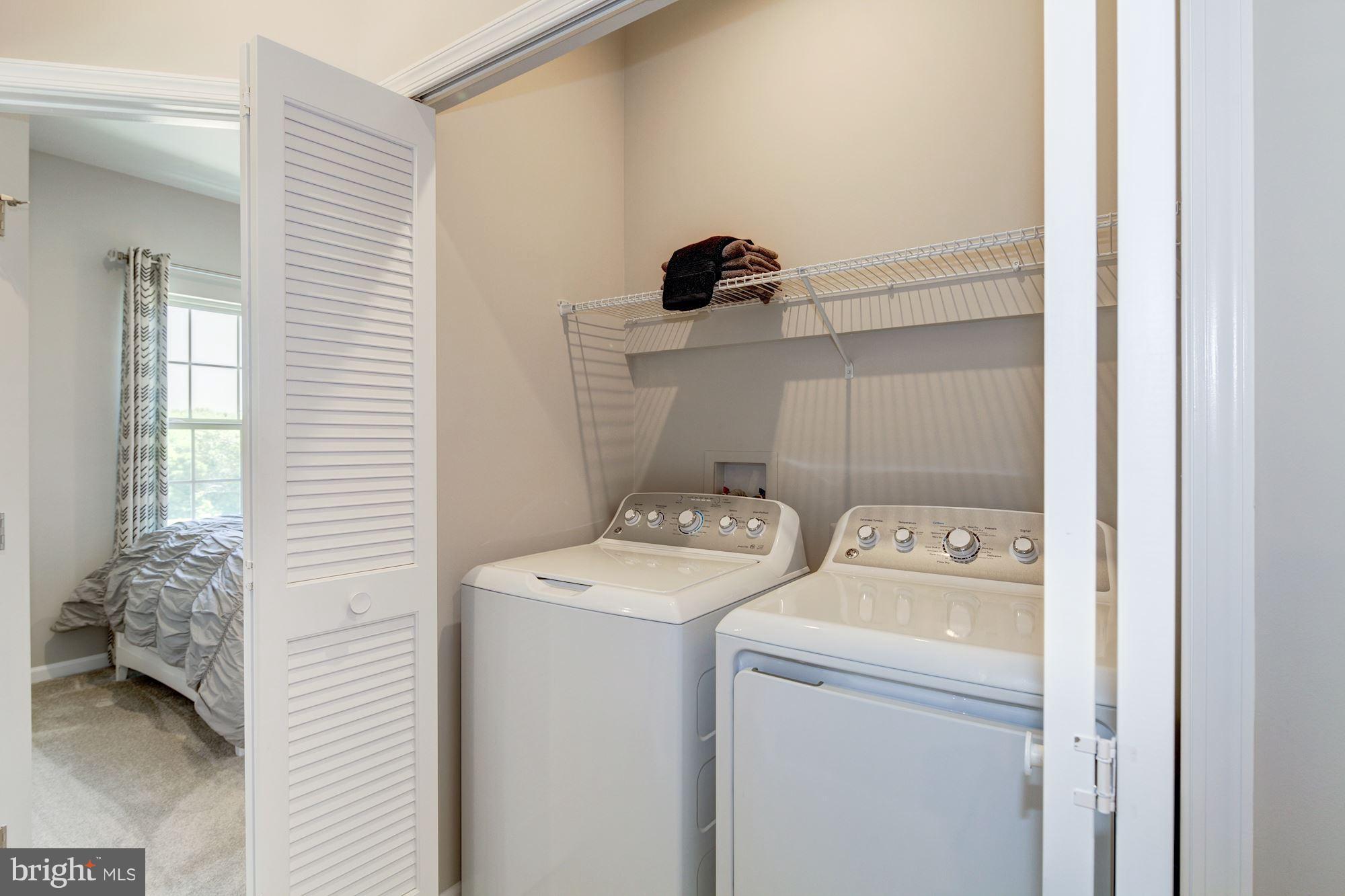 2825 Shaws Road Edgemere, MD 21219 - Photo 8 of 13 a utility room with dryer and washer