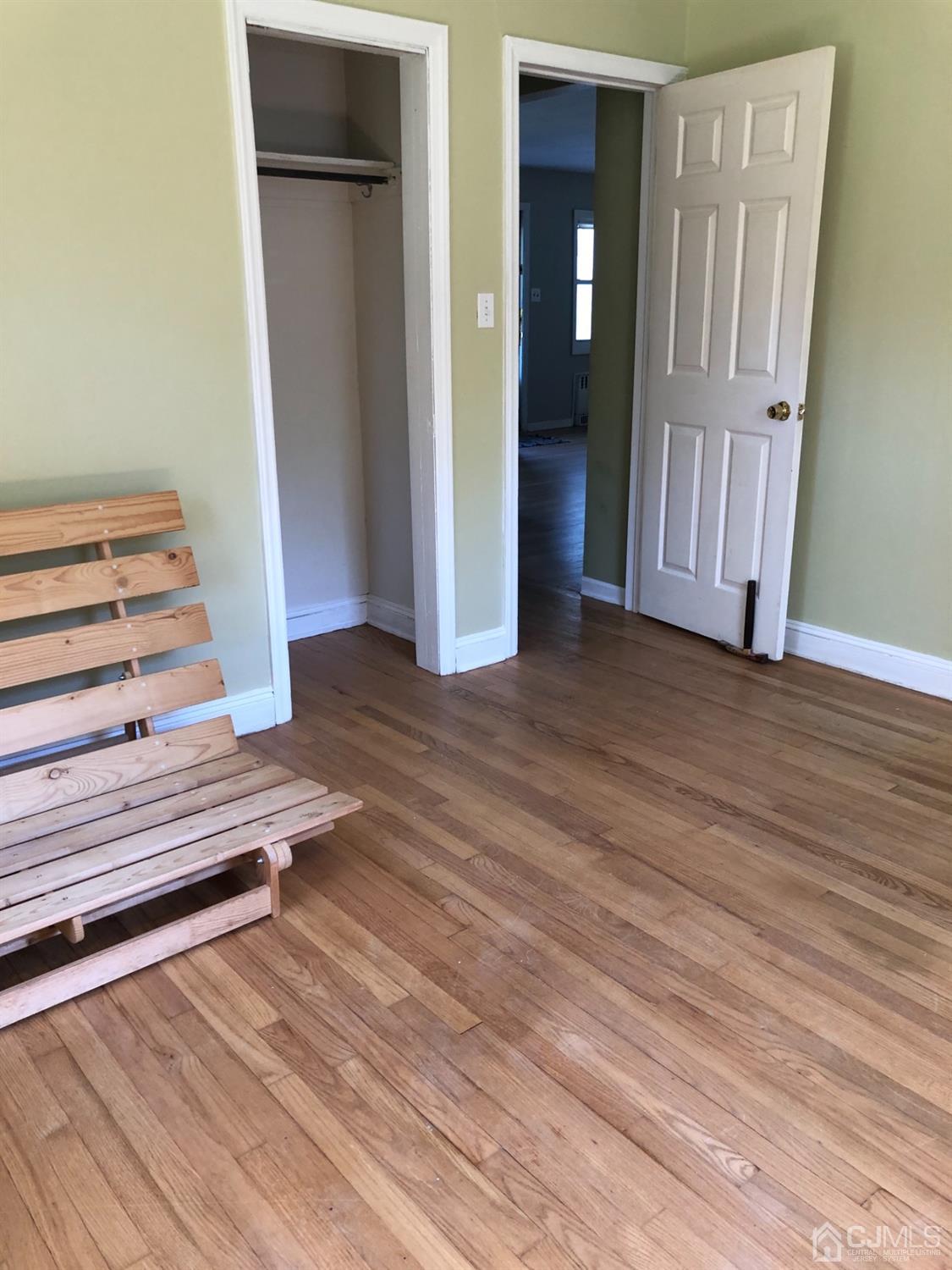 918 River Road Piscataway, NJ 08854 - Photo 5 of 23 Living room and coat closet.