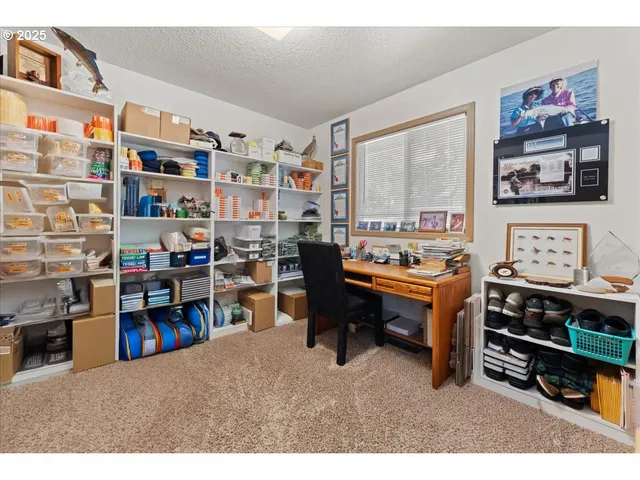 a view of a workspace with furniture