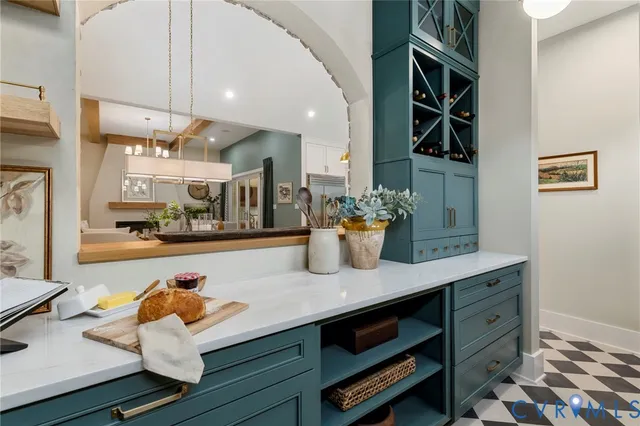 a view of a living room and kitchen