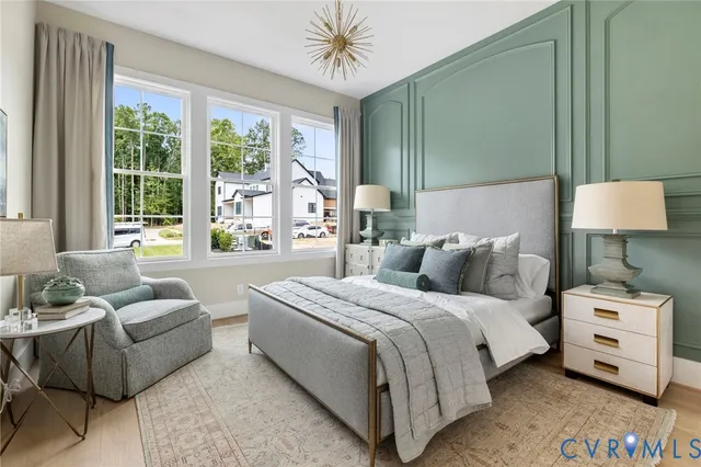 a bedroom with a bed and a couch