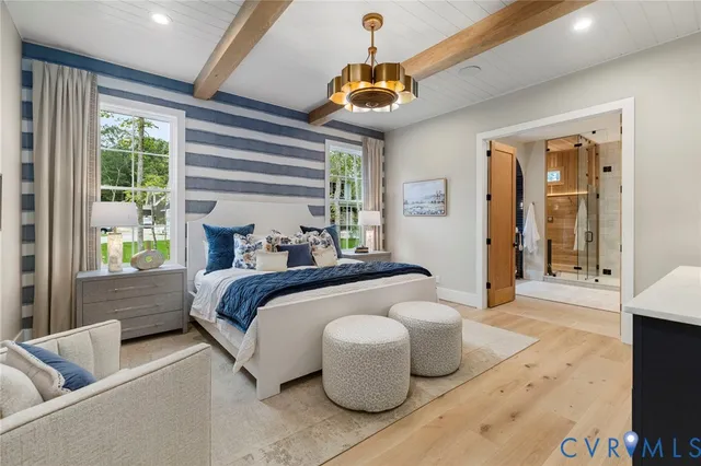 a bedroom with bed and window