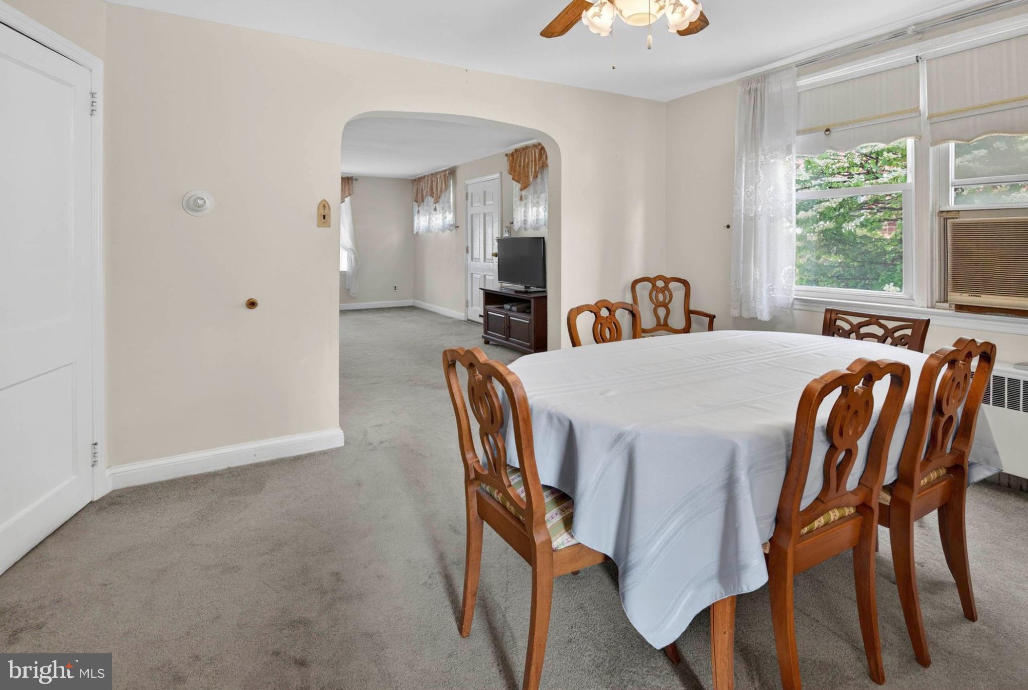 2006 Vista Street Philadelphia, PA 19152 - Photo 7 of 18 a view of a dining room with furniture a chandelier and wooden floor
