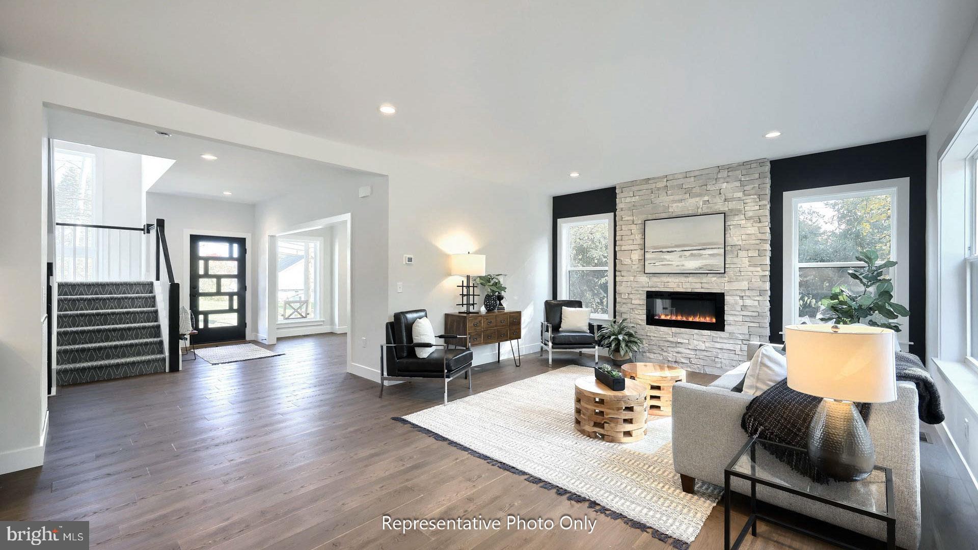 80 Tupelo Street Lititz, PA 17543 - Photo 2 of 22 a living room with furniture and a fireplace