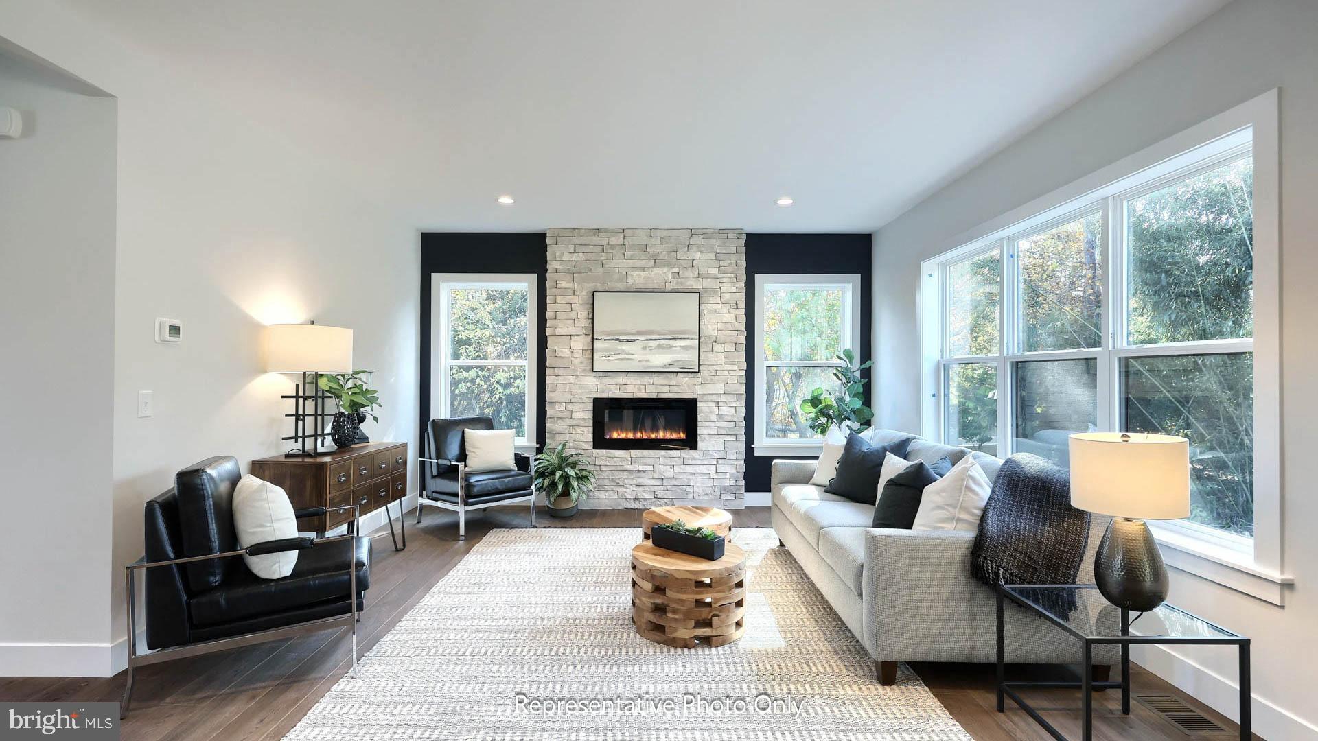 80 Tupelo Street Lititz, PA 17543 - Photo 3 of 22 a living room with furniture and a fireplace