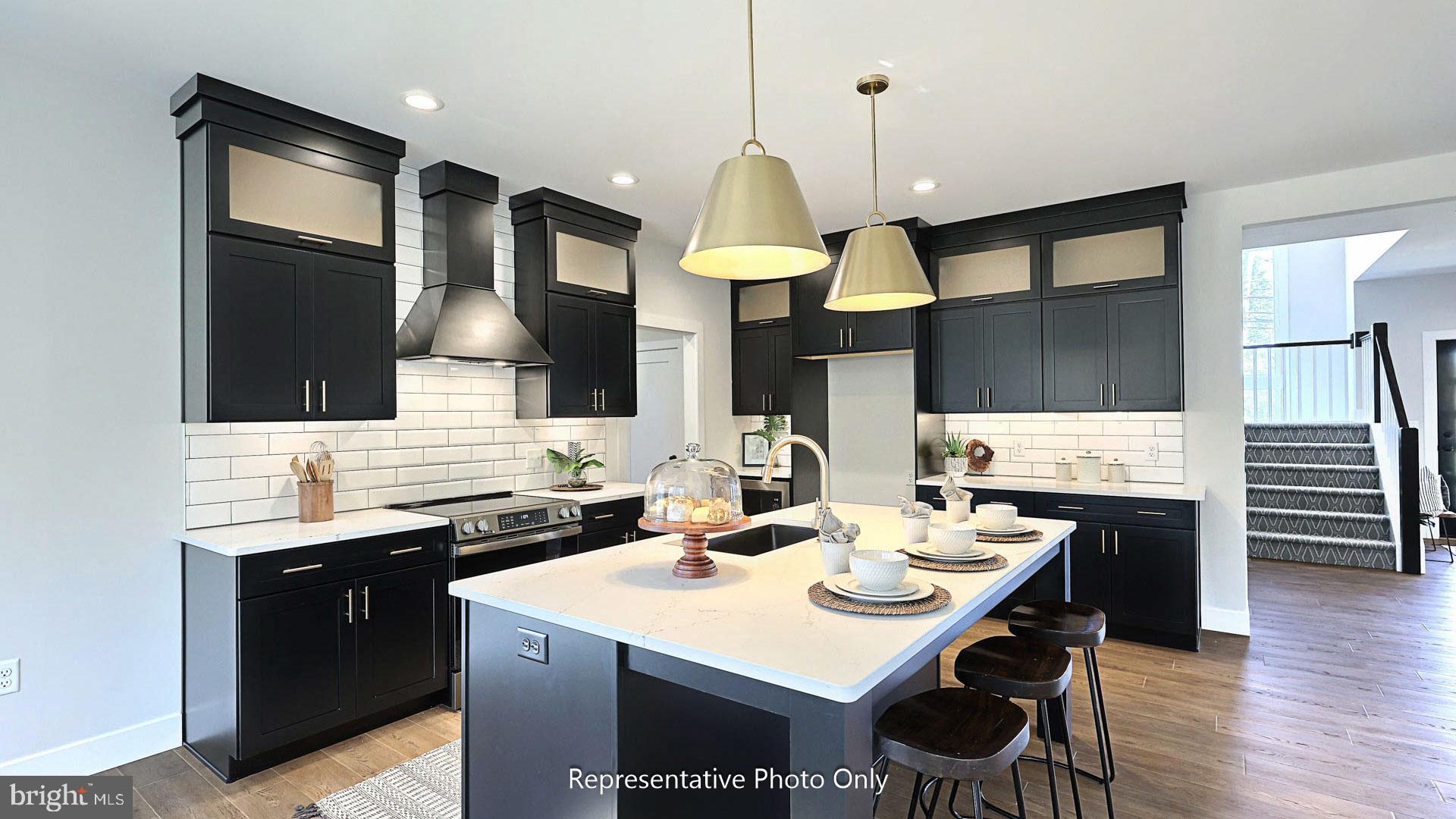 80 Tupelo Street Lititz, PA 17543 - Photo 4 of 22 a kitchen with a sink a counter space and appliances