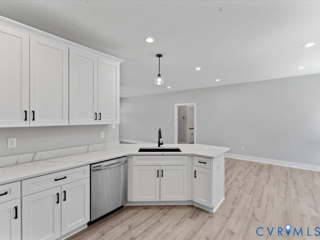 517 Frenchs Store Road Cumberland, VA 23040 - Photo 15 of 22 a kitchen with a sink cabinets and wooden floor