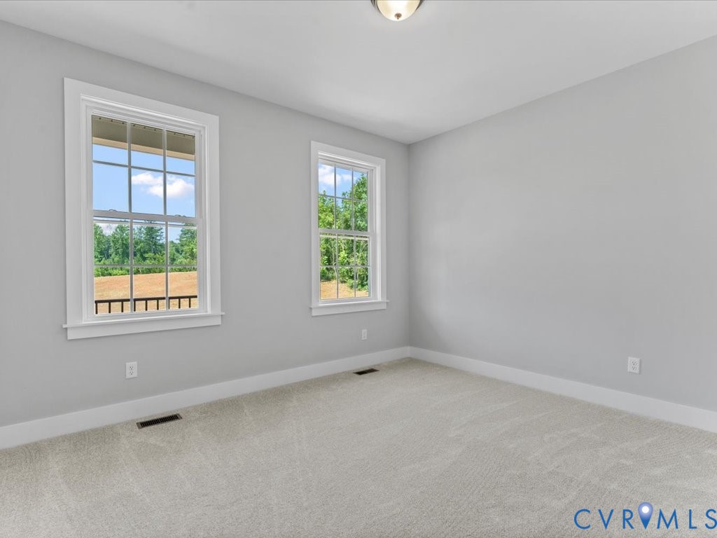 517 Frenchs Store Road Cumberland, VA 23040 - Photo 22 of 22 an empty room with a window