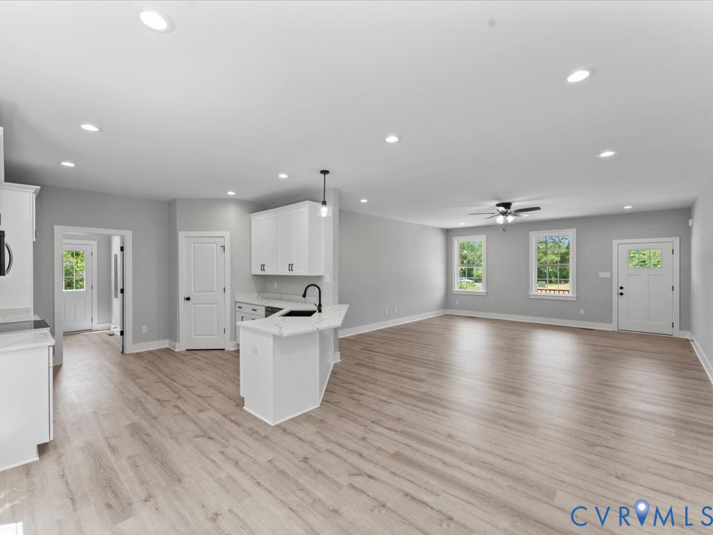 517 Frenchs Store Road Cumberland, VA 23040 - Photo 10 of 22 a view of a kitchen with a sink and a large window