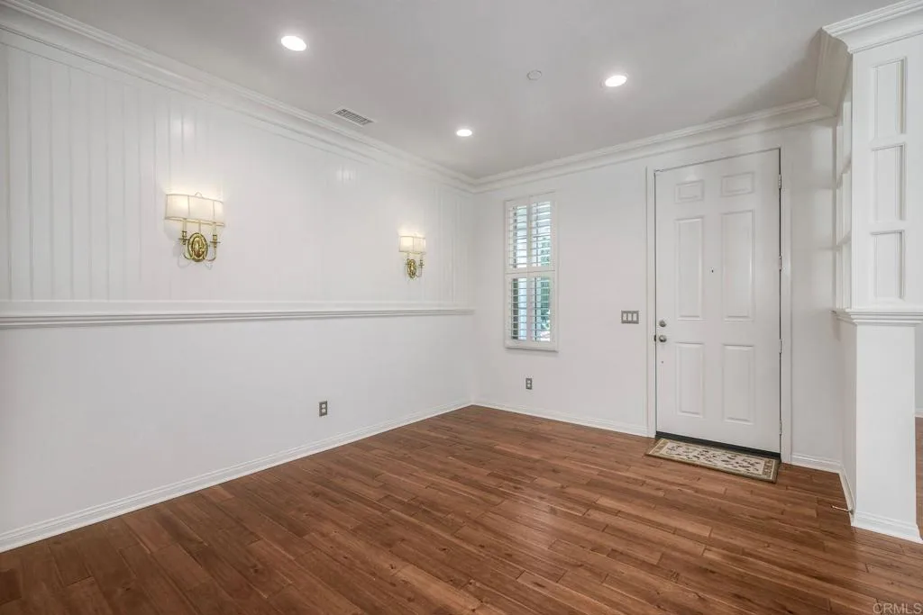 4302 Pacifica Way, Unit 2 Oceanside, NY 11572 - Photo 11 of 51 a view of empty room with wooden floor