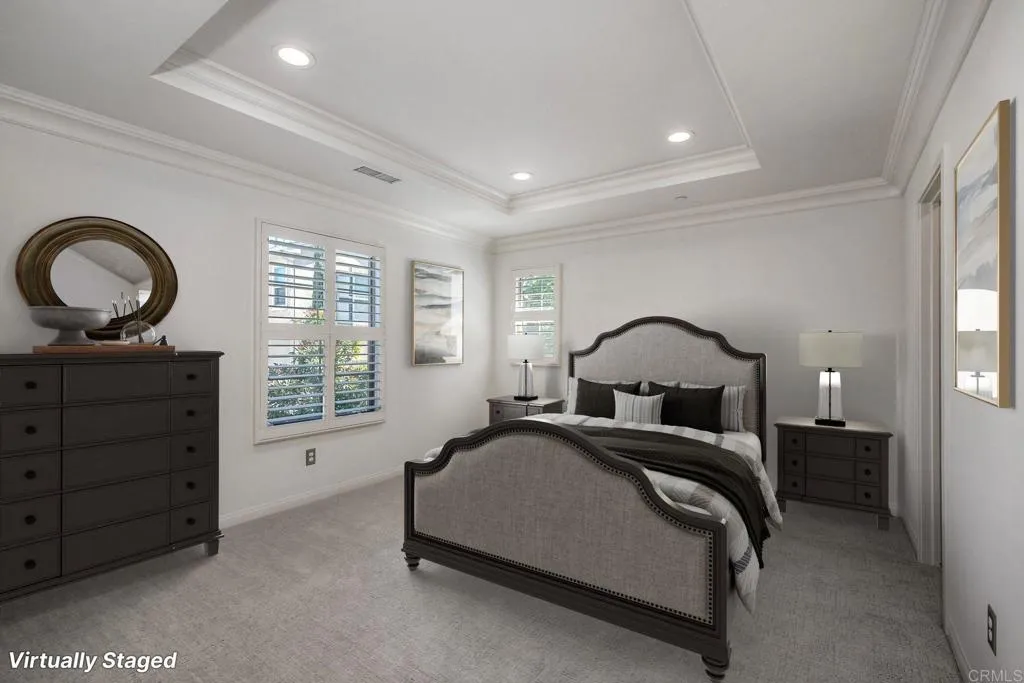 4302 Pacifica Way, Unit 2 Oceanside, NY 11572 - Photo 21 of 51 a spacious bedroom with a bed and a dresser