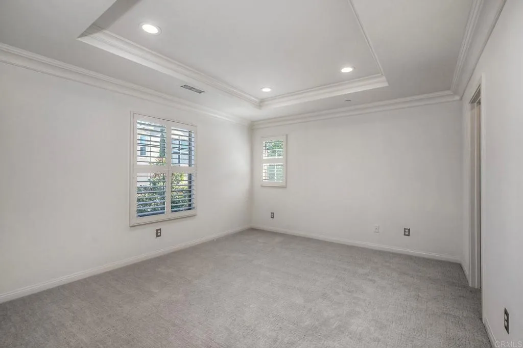 4302 Pacifica Way, Unit 2 Oceanside, NY 11572 - Photo 22 of 51 an empty room with windows