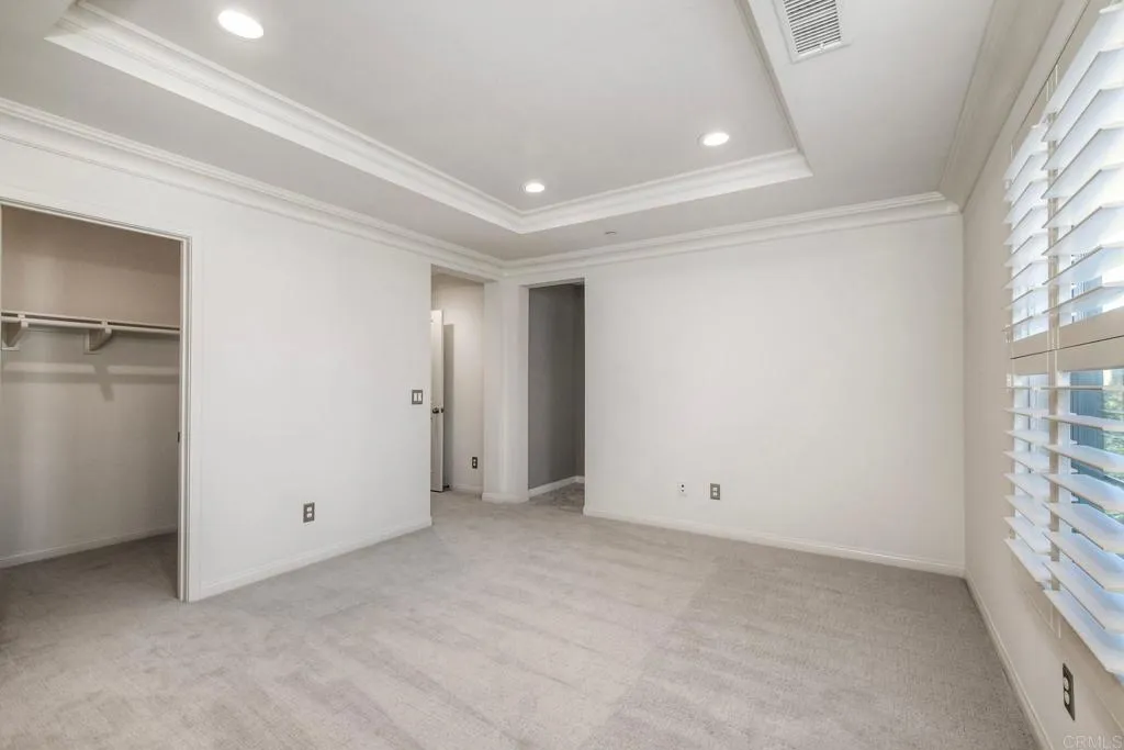 4302 Pacifica Way, Unit 2 Oceanside, NY 11572 - Photo 23 of 51 an empty room with windows