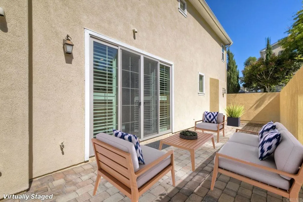 4302 Pacifica Way, Unit 2 Oceanside, NY 11572 - Photo 33 of 51 a outdoor living space with furniture and a potted plant