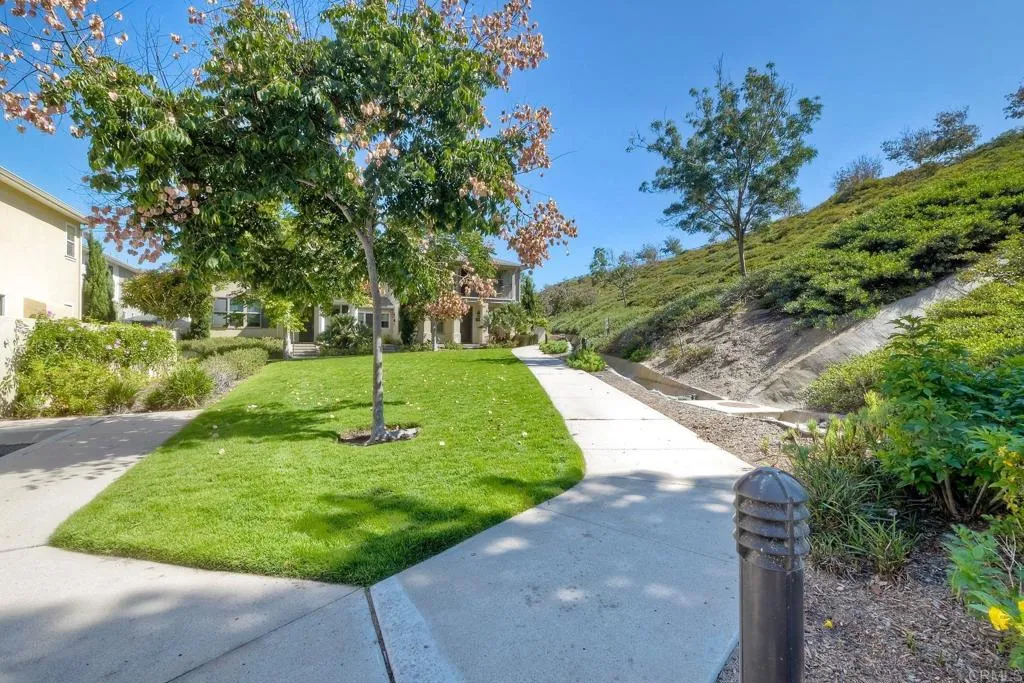 4302 Pacifica Way, Unit 2 Oceanside, NY 11572 - Photo 40 of 51 a view of a park with a pathway