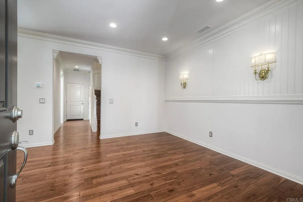 4302 Pacifica Way, Unit 2 Oceanside, NY 11572 - Photo 10 of 51 wooden floor in an empty room