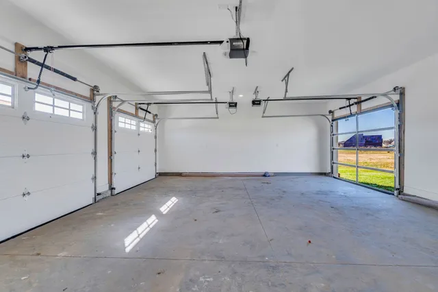 a front view of a house with a yard table and chairs