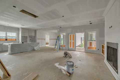a view of a livingroom with furniture and windows