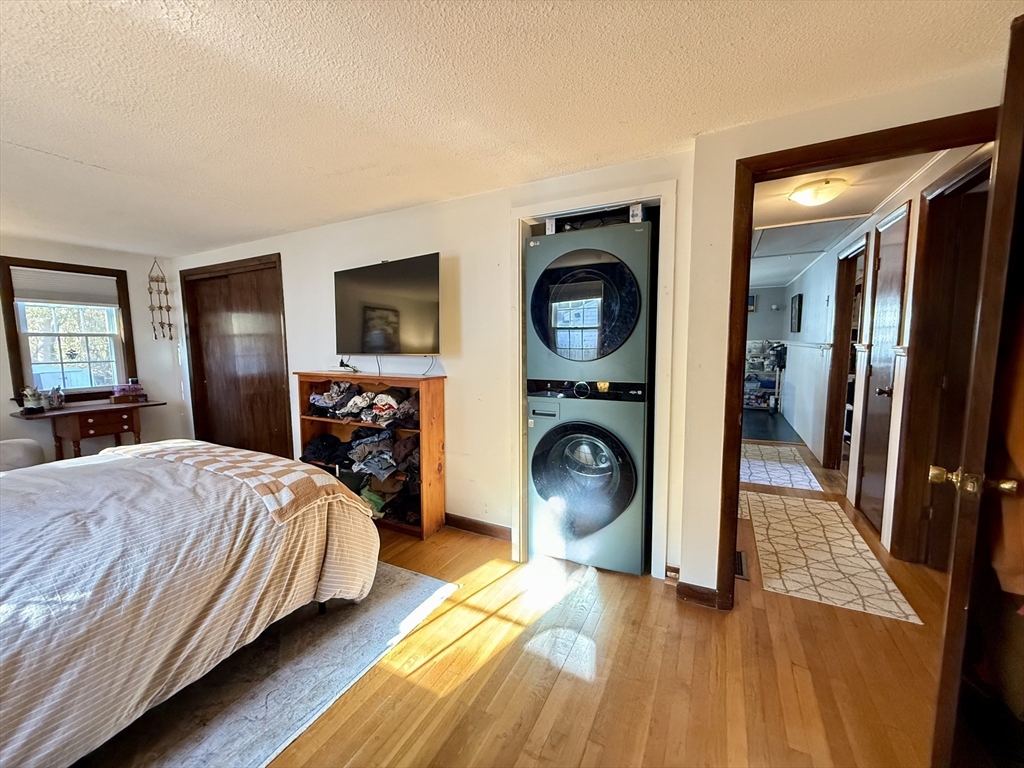 23 Circuit Road North Yarmouth, MA 02673 - Photo 16 of 34 a bedroom with a bed and a mirror