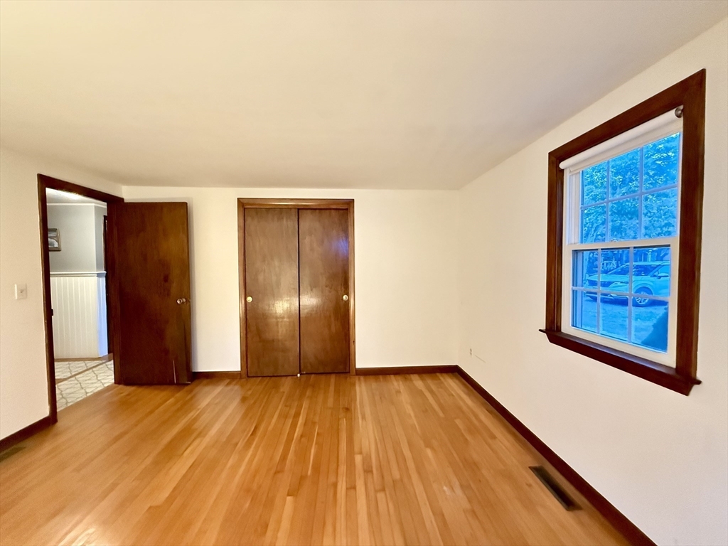 23 Circuit Road North Yarmouth, MA 02673 - Photo 21 of 34 a view of an empty room with wooden floor and a window