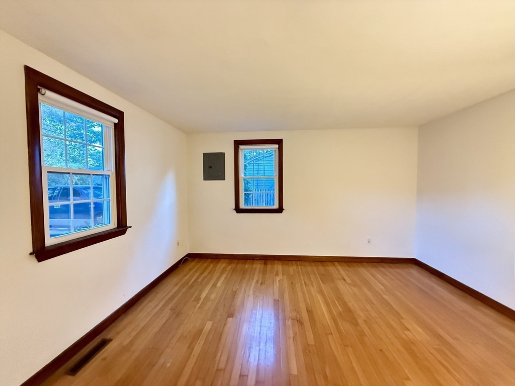 23 Circuit Road North Yarmouth, MA 02673 - Photo 22 of 34 a view of an empty room with wooden floor and a window