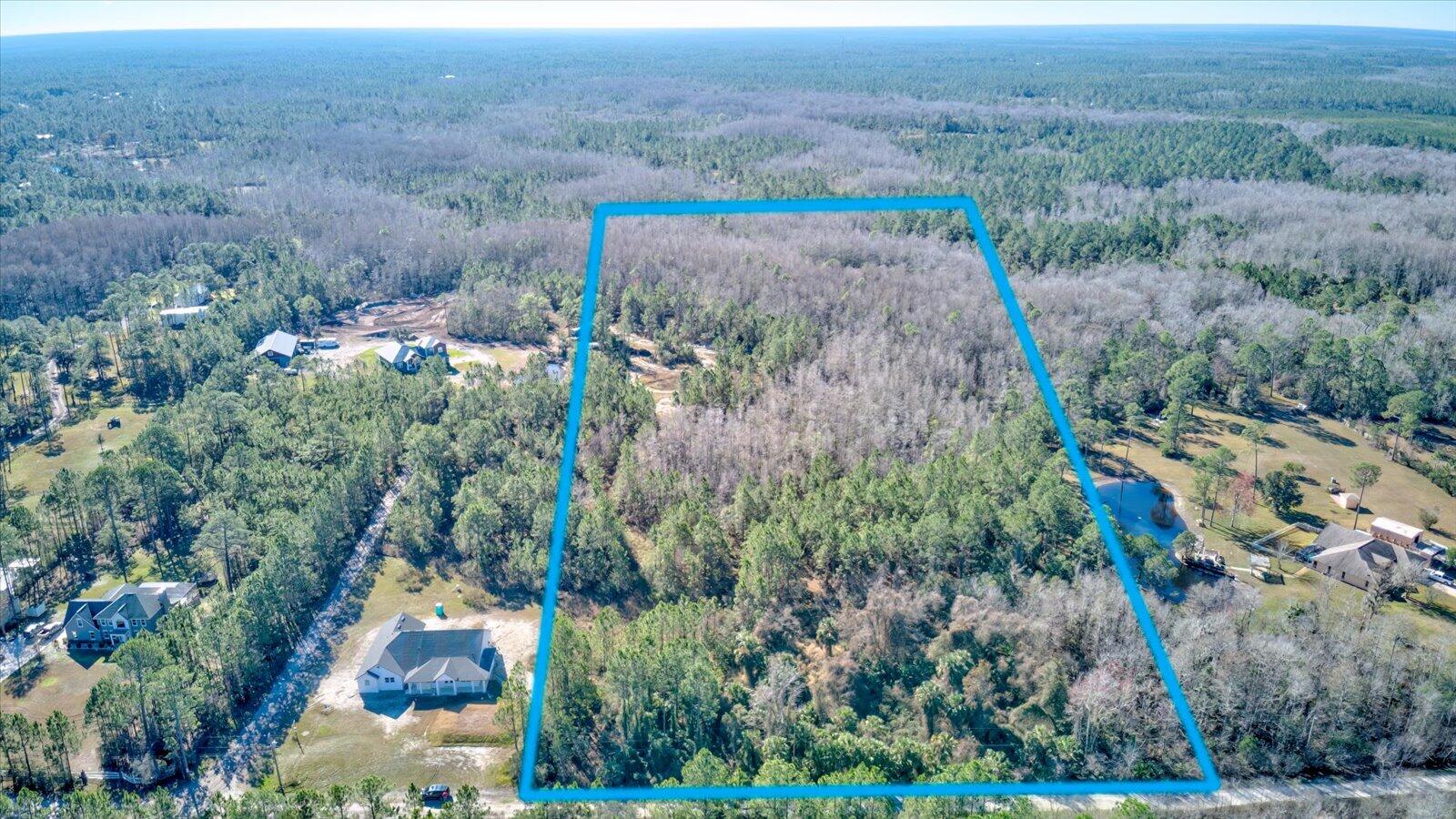 0 Rodeo Acres Drive Ormond Beach, FL 32174 - Photo 15 of 20 an aerial view of a house with a yard