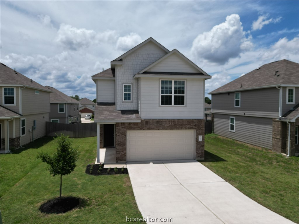 982 Rice Drive Bryan, TX 77803 - Photo 1 of 39 Contemporary two-story residence featuring a brick and siding exterior