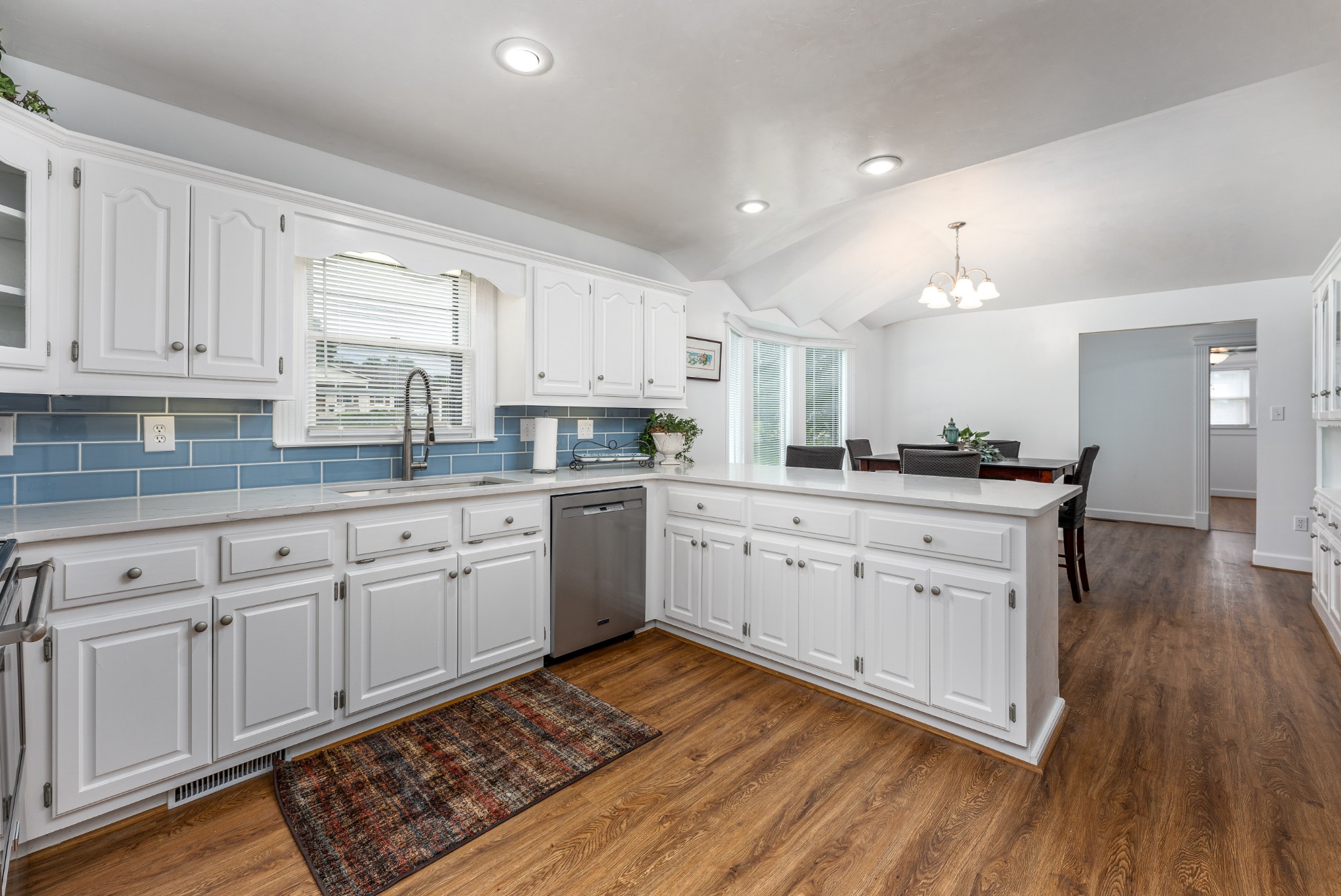 7 South Patrick Road Fayetteville, TN 37334 - Photo 20 of 32 a kitchen with cabinets oven and a dishwasher with wooden floor