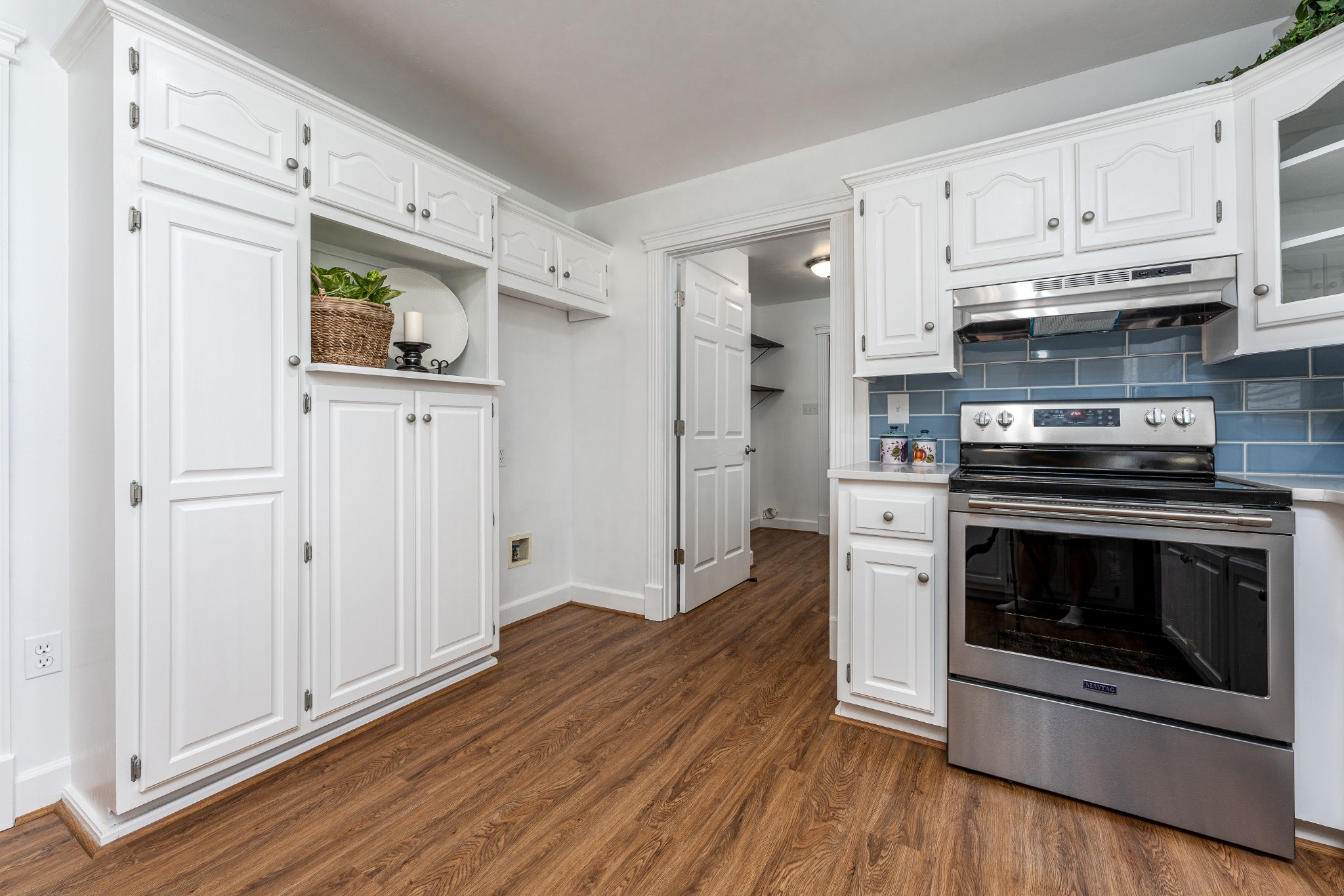 7 South Patrick Road Fayetteville, TN 37334 - Photo 21 of 32 a kitchen with stainless steel appliances a stove top oven and cabinets