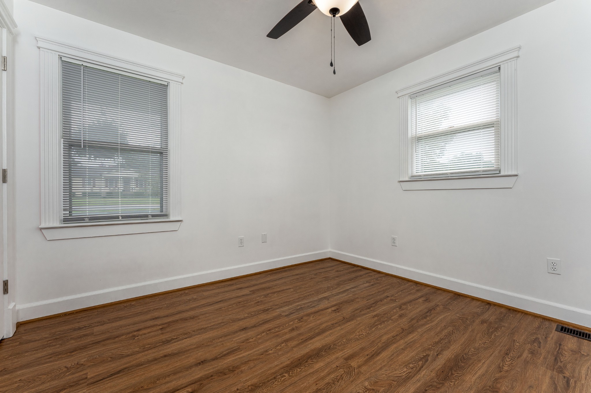 7 South Patrick Road Fayetteville, TN 37334 - Photo 7 of 32 wooden floor in an empty room with a window