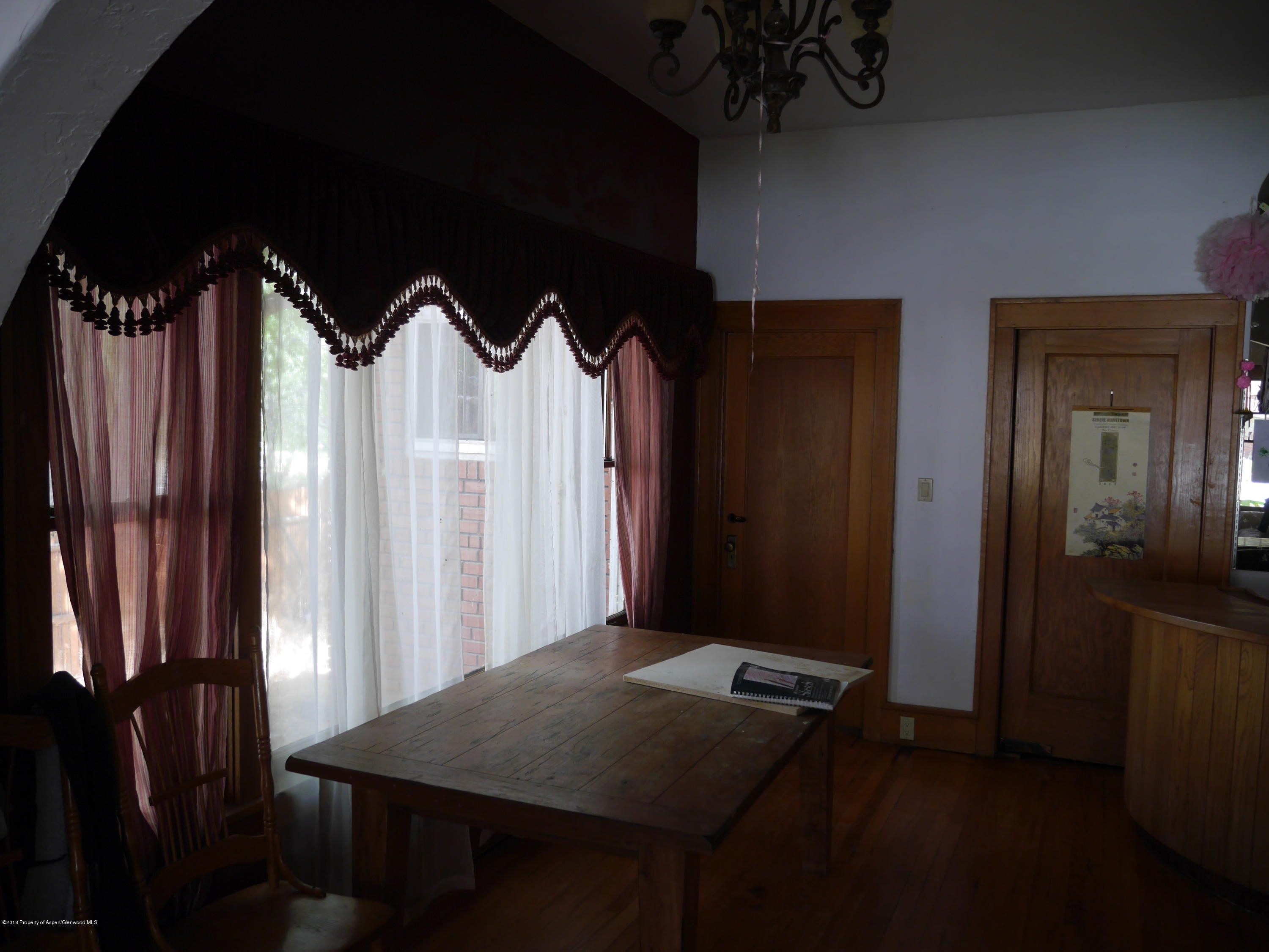 425 West 3rd Street Rifle, CO 81650 - Photo 12 of 14 a table that has a table and chairs in it