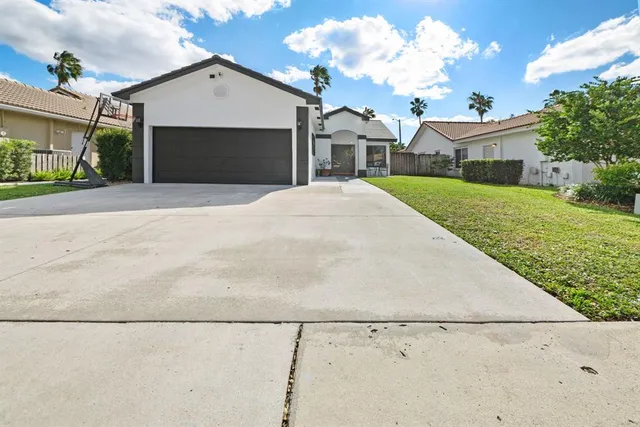 $615,000 | 12440 Southwest 7th Place, Davie, FL 33325