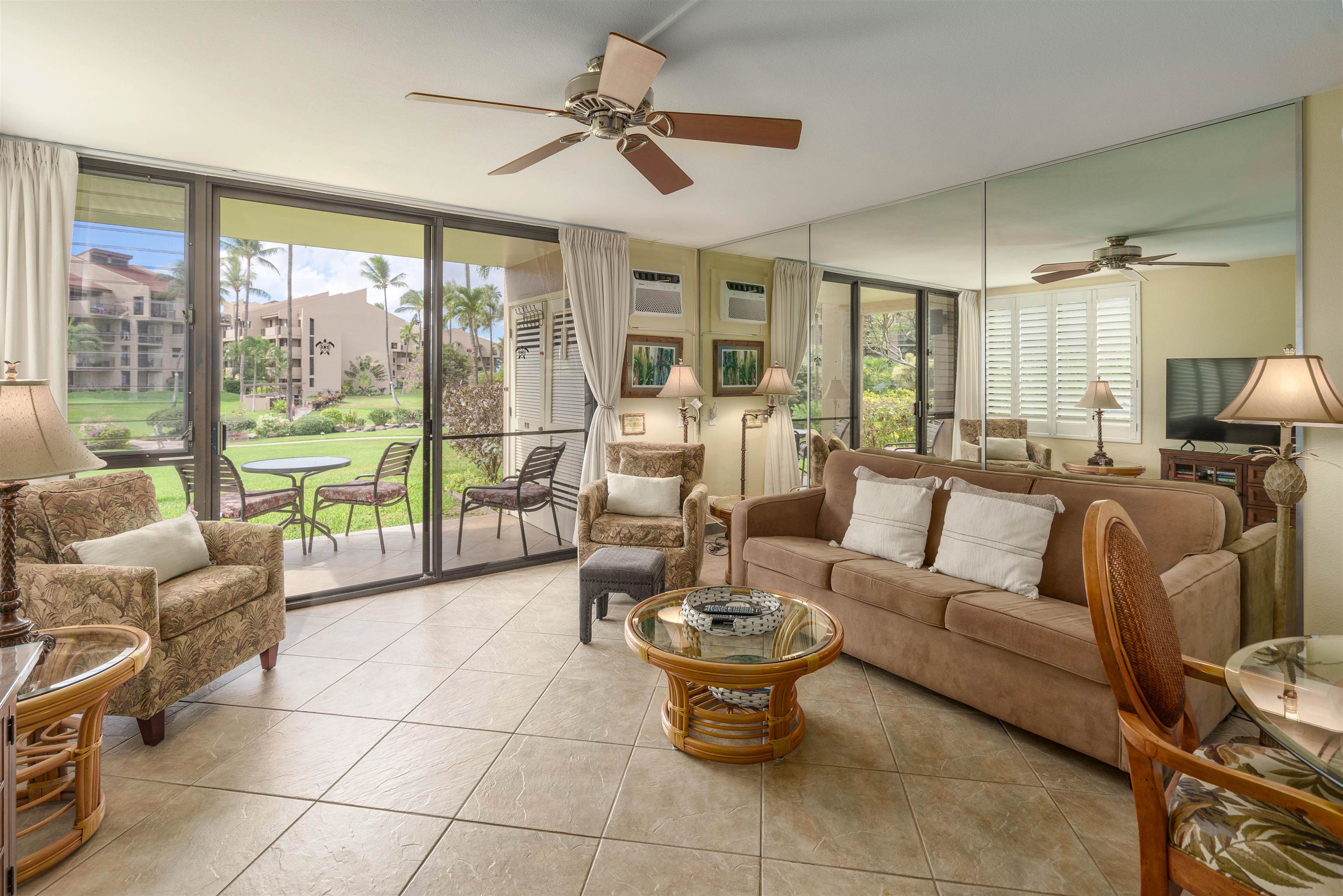 2695 South Kihei Road, Unit 2102 Kihei, HI 96753 - Photo 15 of 35 a living room with furniture and a floor to ceiling window