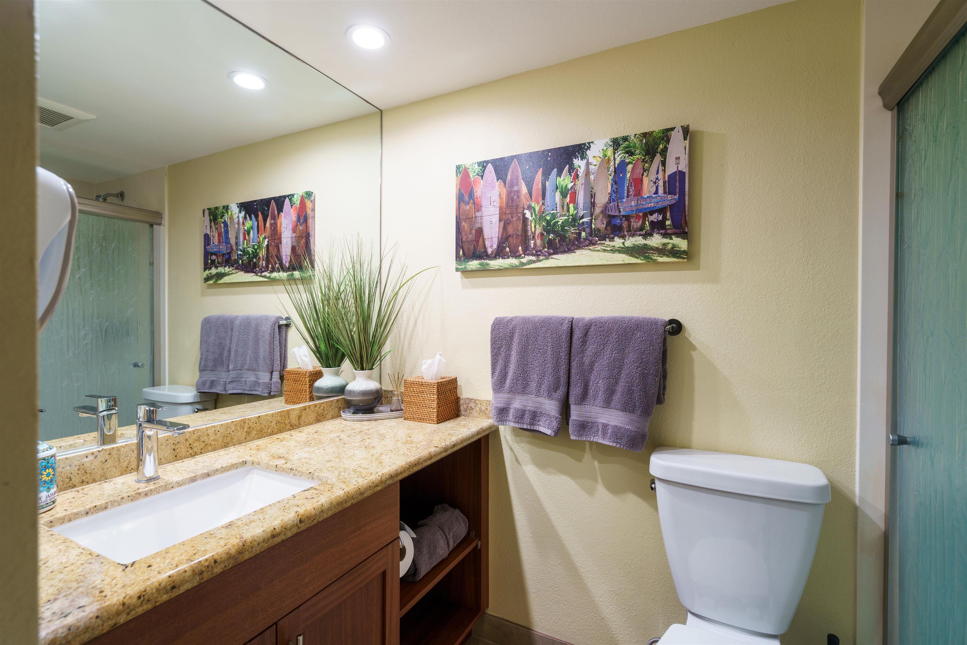 2695 South Kihei Road, Unit 2102 Kihei, HI 96753 - Photo 24 of 35 a bathroom with a granite countertop sink mirror vanity and toilet