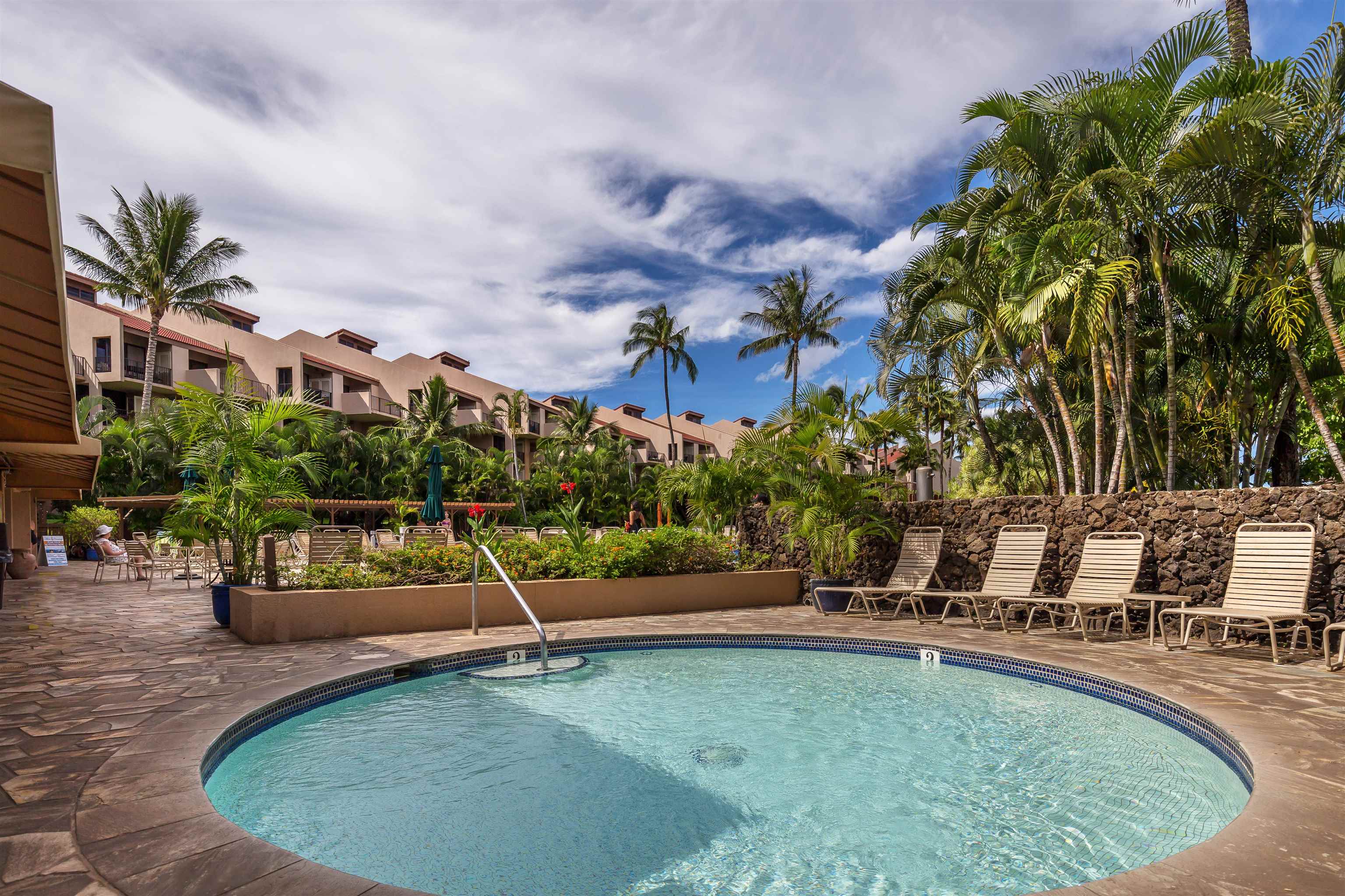 2695 South Kihei Road, Unit 2102 Kihei, HI 96753 - Photo 31 of 35 a view of a swimming pool with a patio