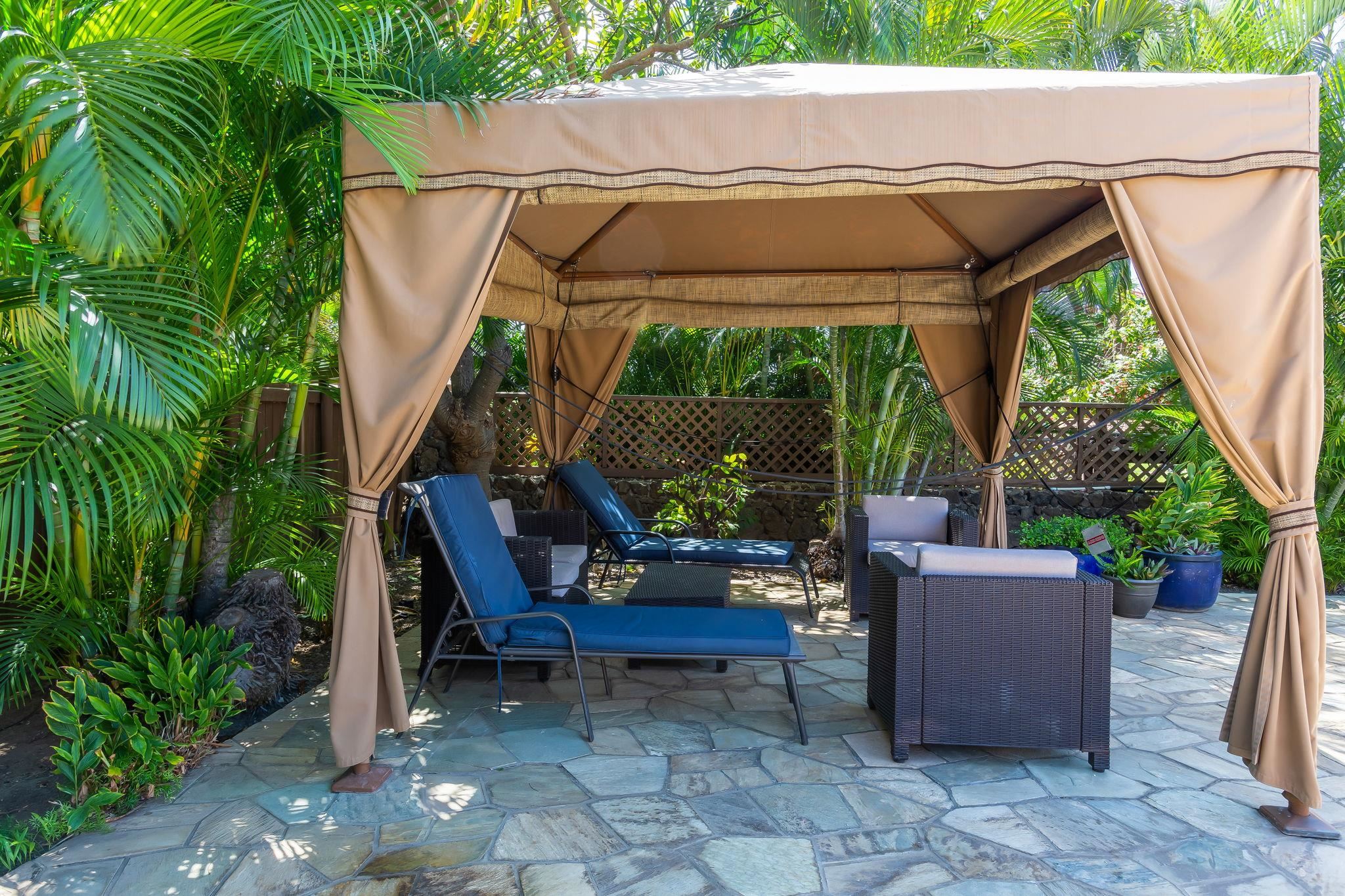 2695 South Kihei Road, Unit 2102 Kihei, HI 96753 - Photo 33 of 35 a patio with table and chairs