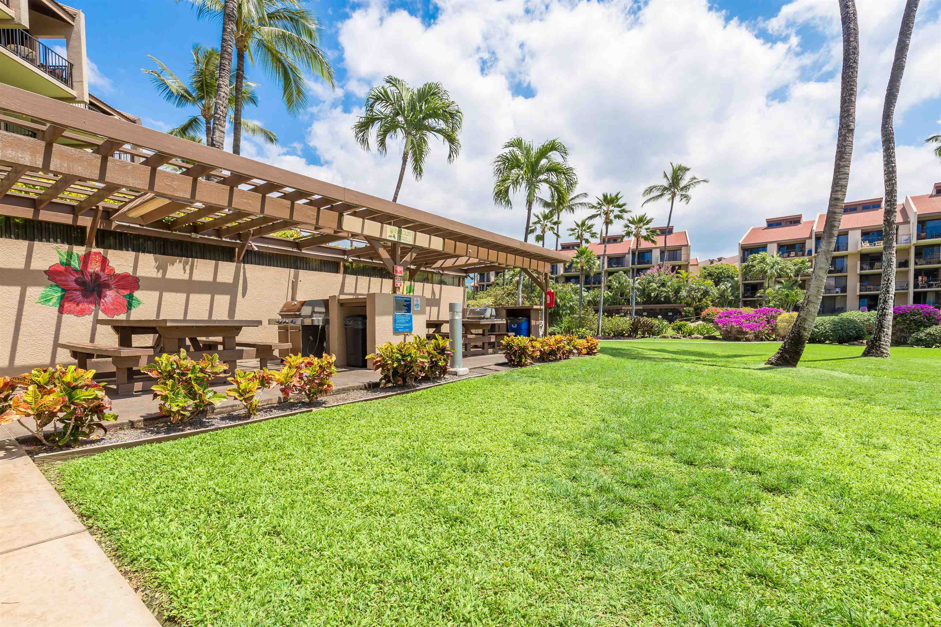 2695 South Kihei Road, Unit 2102 Kihei, HI 96753 - Photo 34 of 35 a view of a house with a garden and plants