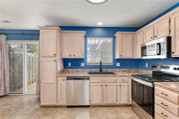 $205,000 | 1327 Southeast Broadway Circle, Lee's Summit, MO 64081