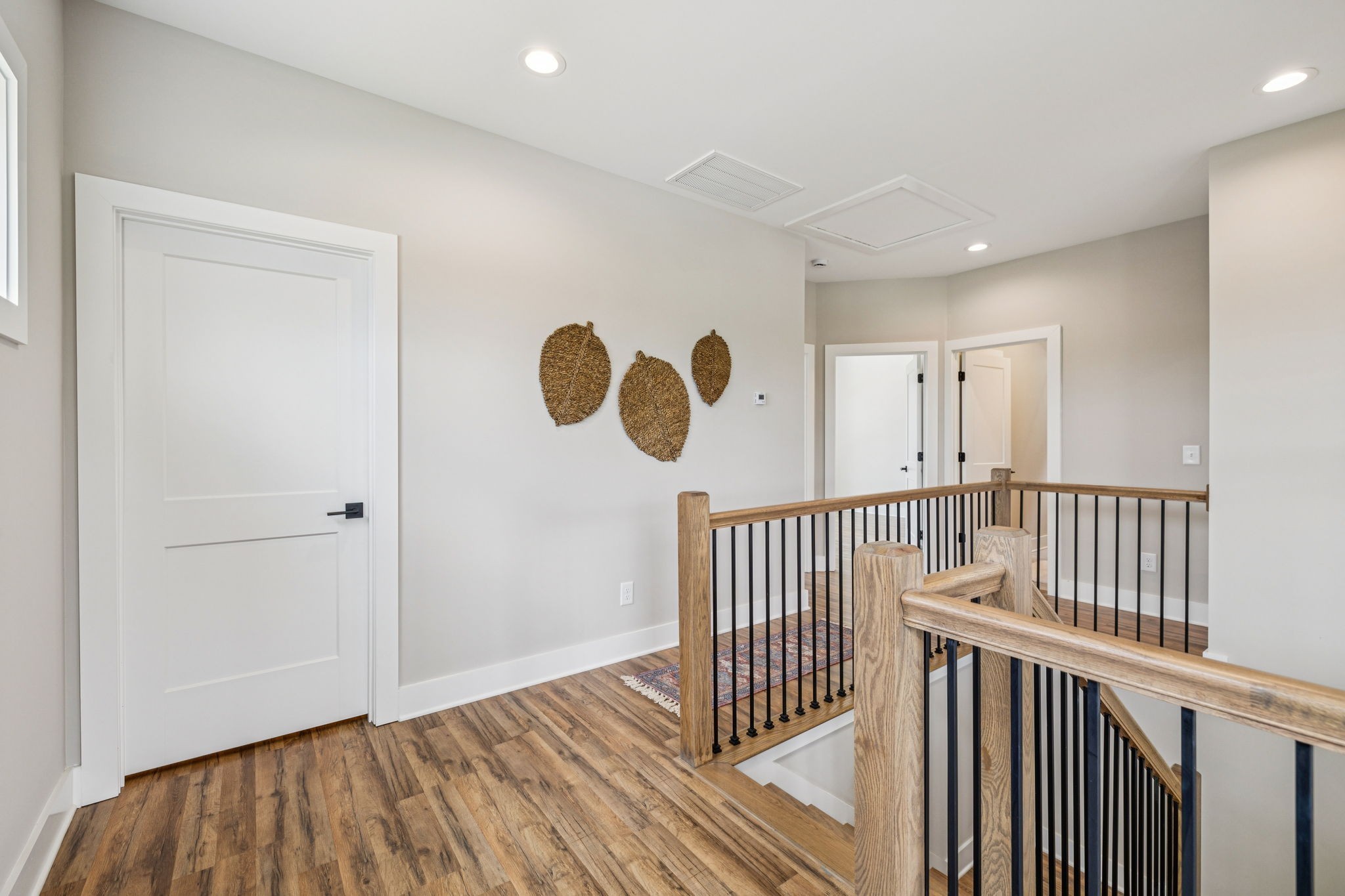 257 B Riverside Drive Nashville, TN 37206 - Photo 23 of 56 a view of a hallway with wooden floor