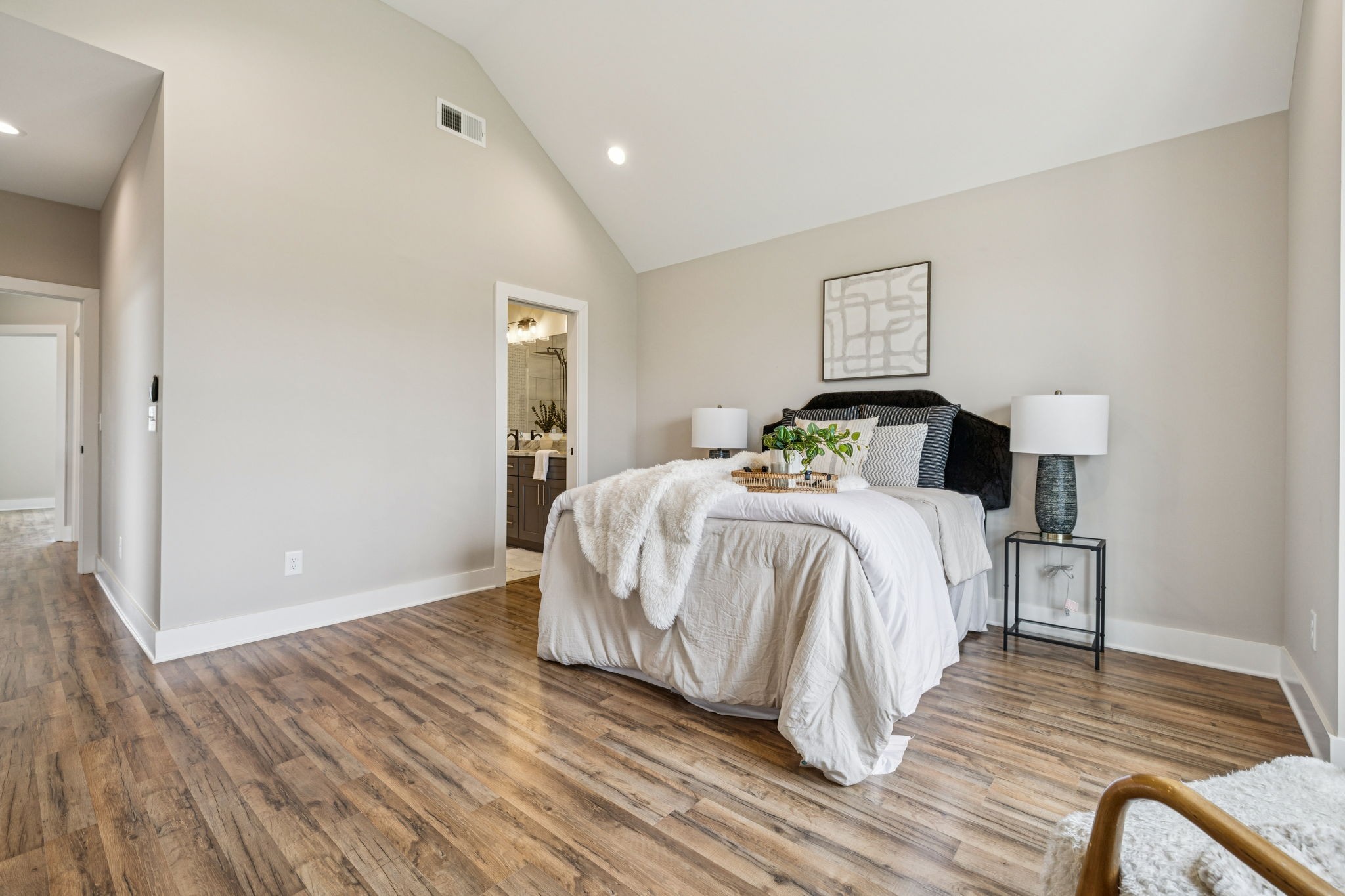 257 B Riverside Drive Nashville, TN 37206 - Photo 25 of 56 a bedroom with a bed and wooden floor