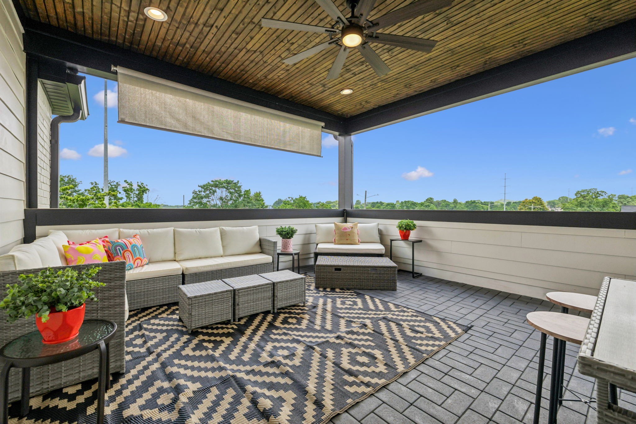 257 B Riverside Drive Nashville, TN 37206 - Photo 34 of 56 a roof deck with table and chairs